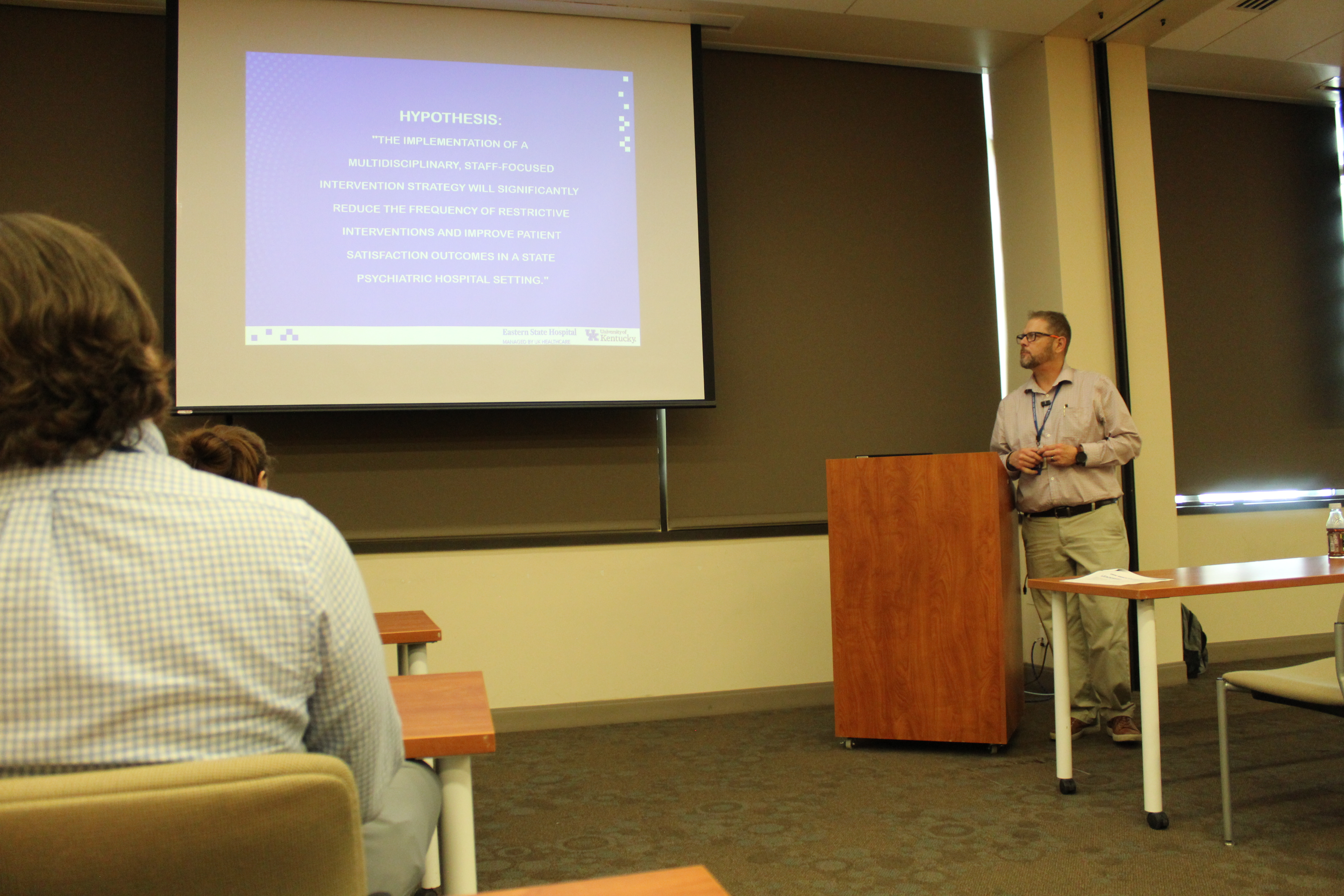jim with powerpoint slide