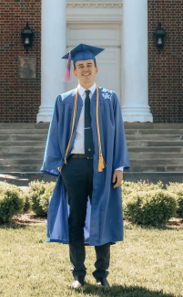 man in graduation outfit