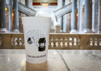 cup in front of columns