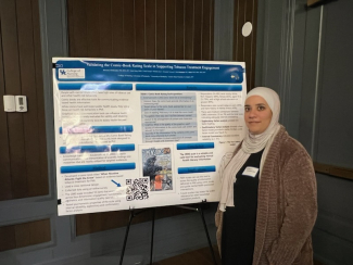 Dr. Bassema AbuFarsakh presenting her poster