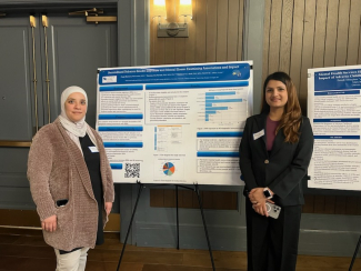 Pooja Bhattarai and Dr. AbuFarsakh with their poster