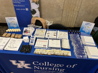 table with giveaways and research