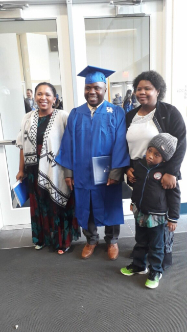 college grad with family