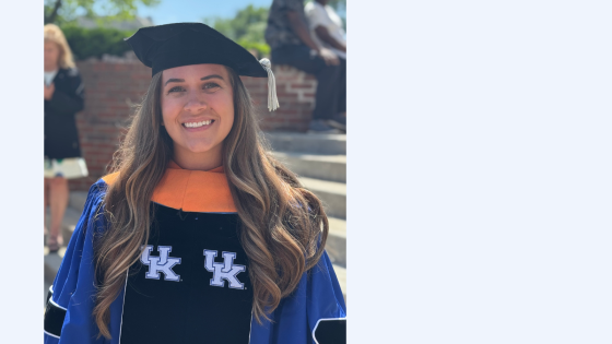 young woman in graduation regalia for doctorate