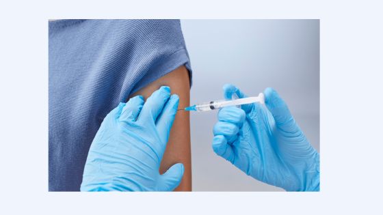 person receiving injection in arm